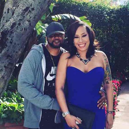 Bernard and his wife, Alex posing for a picture